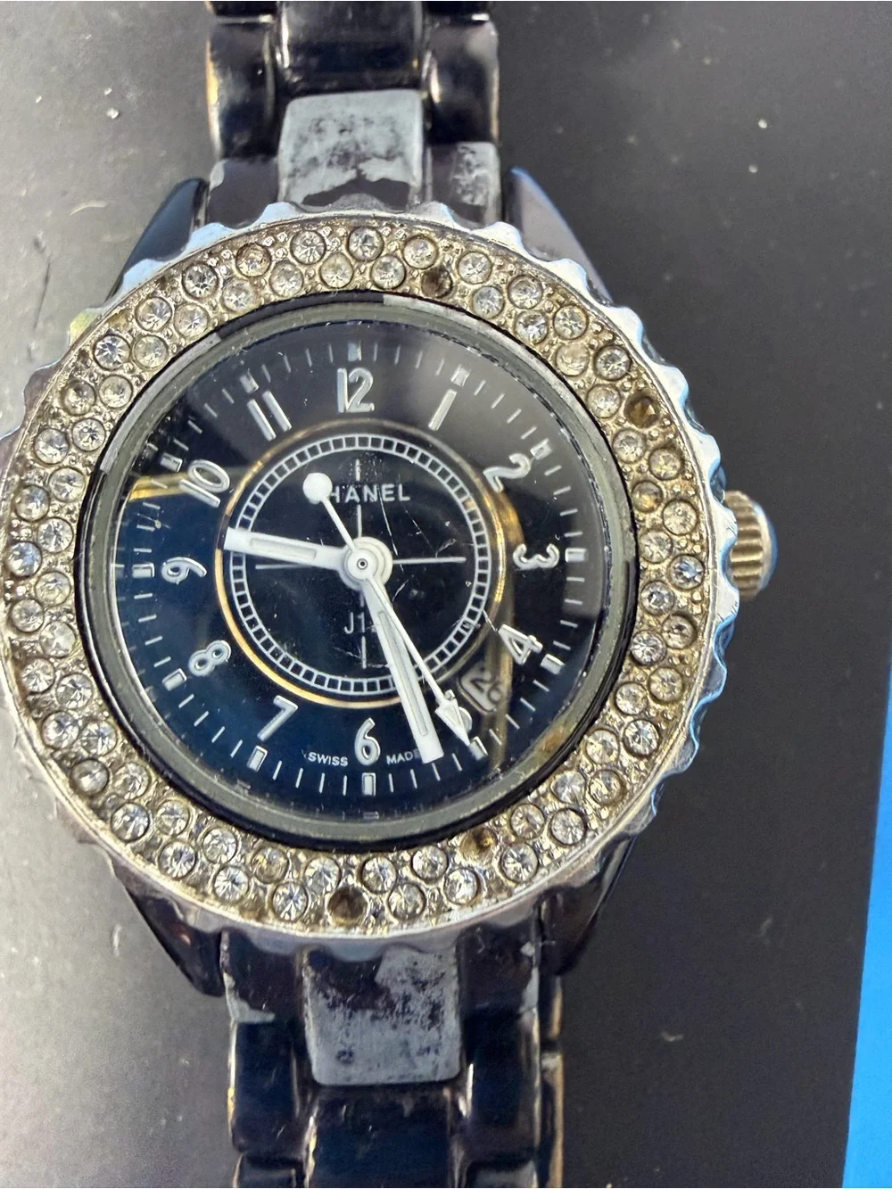 Chanel J12 women's wristwatch with a black ceramic case and bracelet and a bezel